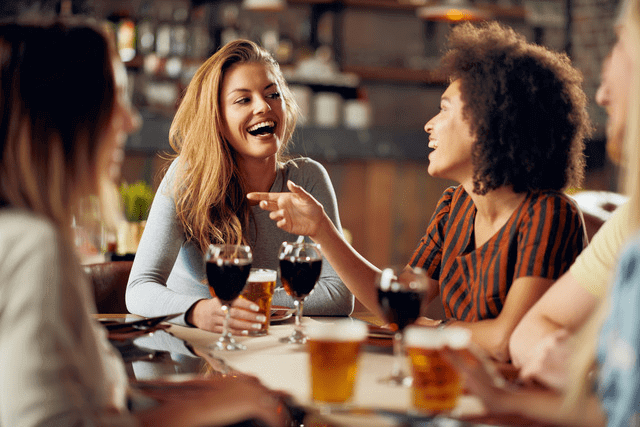 women drinking at the table